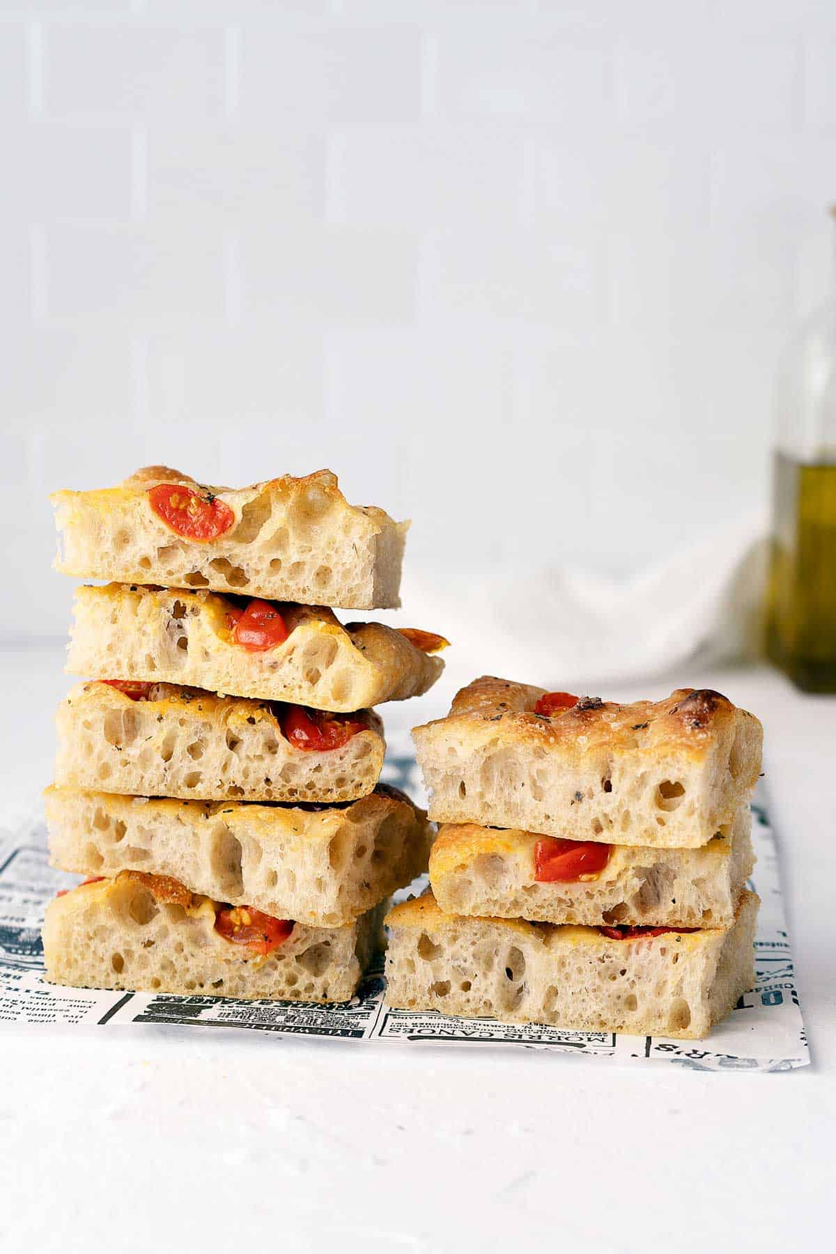 stacked pieces of no-knead focaccia