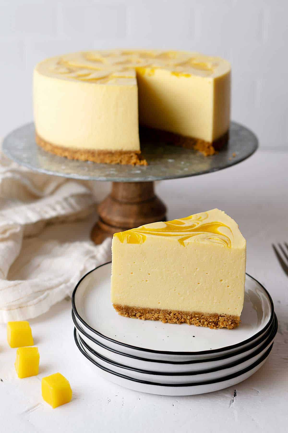 mango cheesecake portion on a plate