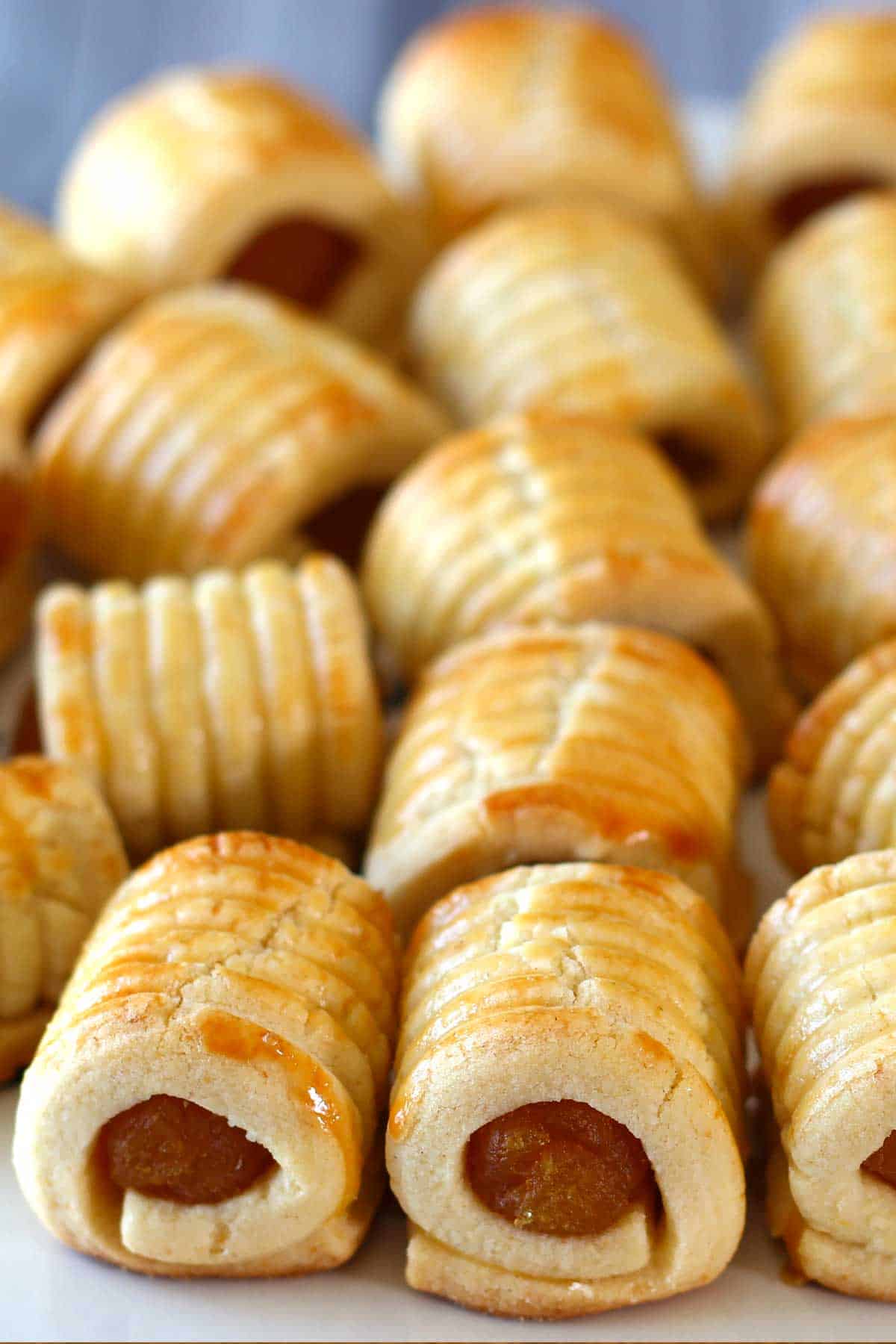 pineapple tarts on a serving plate.