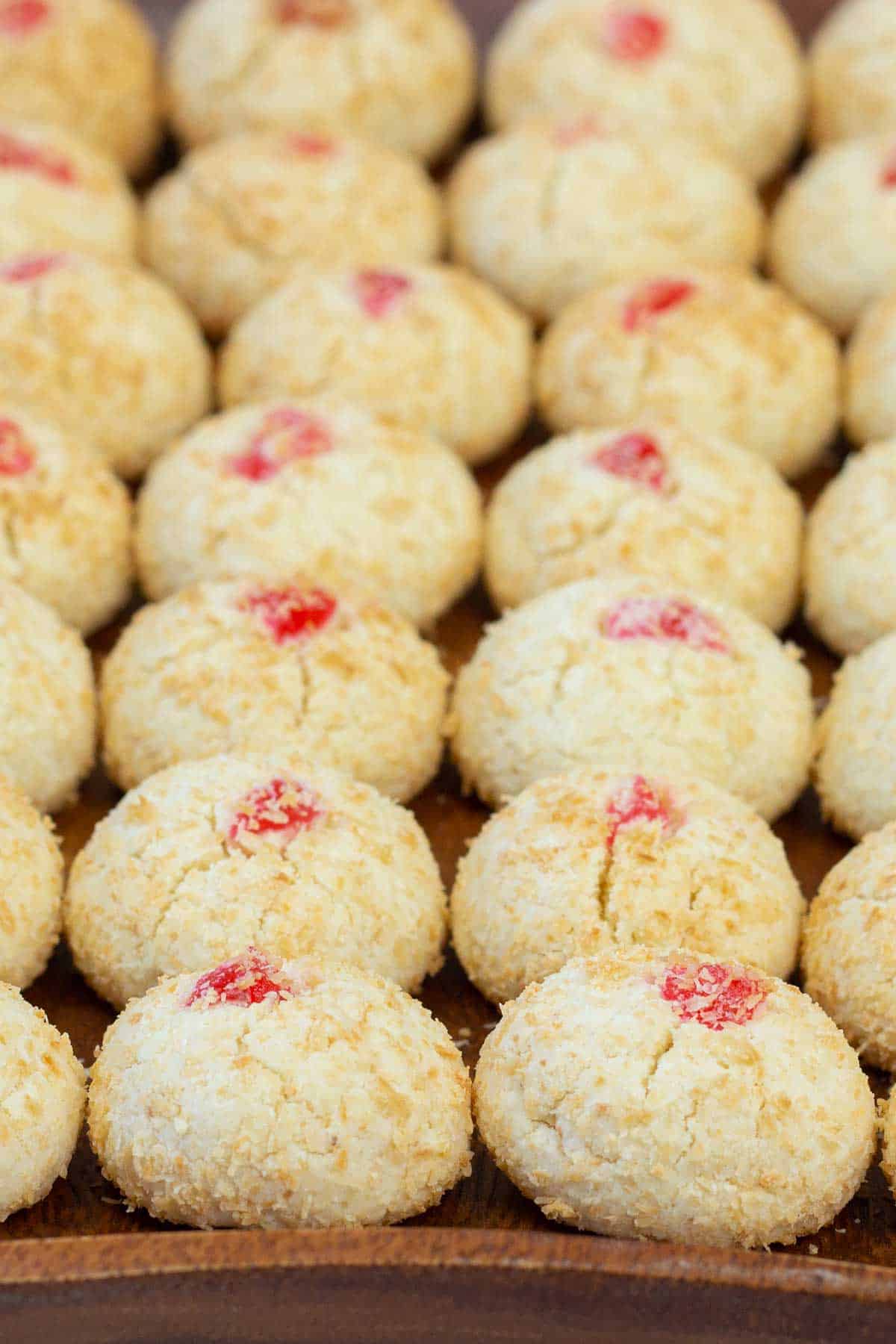 Malaysian coconut cookies on a wooden tray.