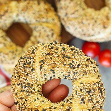 Holding Turkish Sesame Bread Simit