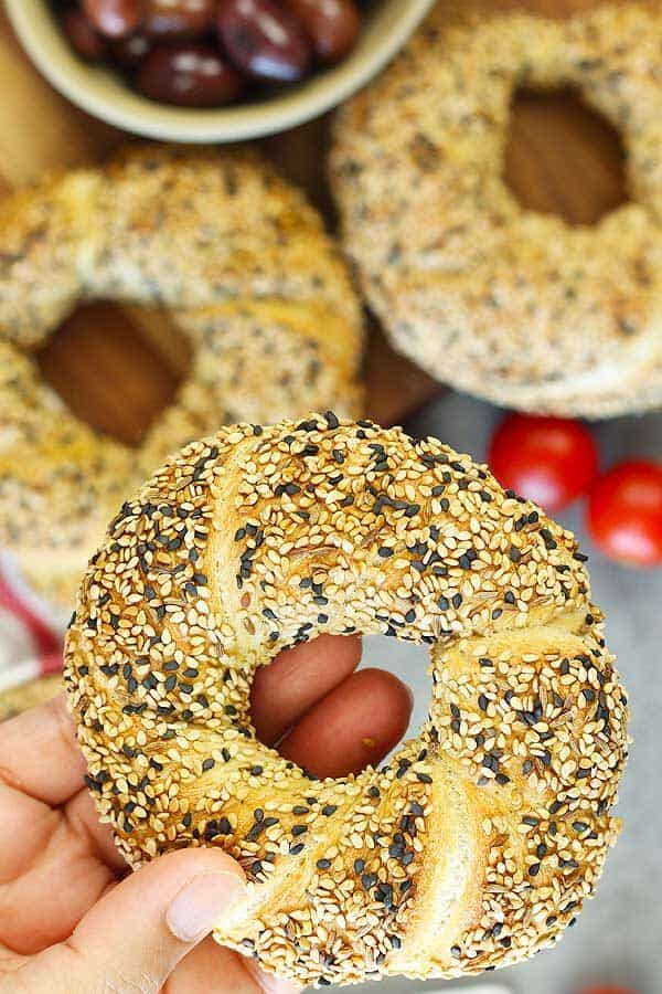 Holding Turkish Sesame Bread Simit