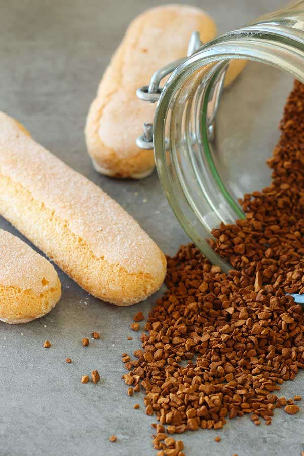 Coffee granules and ladyfingers on a table