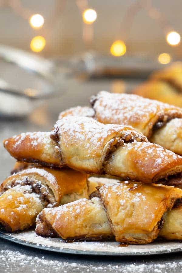 Close up rugelach cookies on a plate.