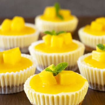 Mini Mango Lassi Cheesecakes on a table