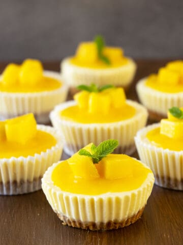 Mini Mango Lassi Cheesecakes on a table