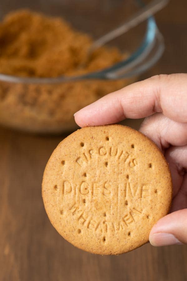 holding a digestive biscuit