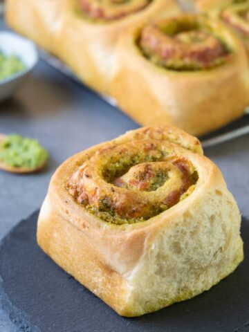 Pesto roll on a black stone plate