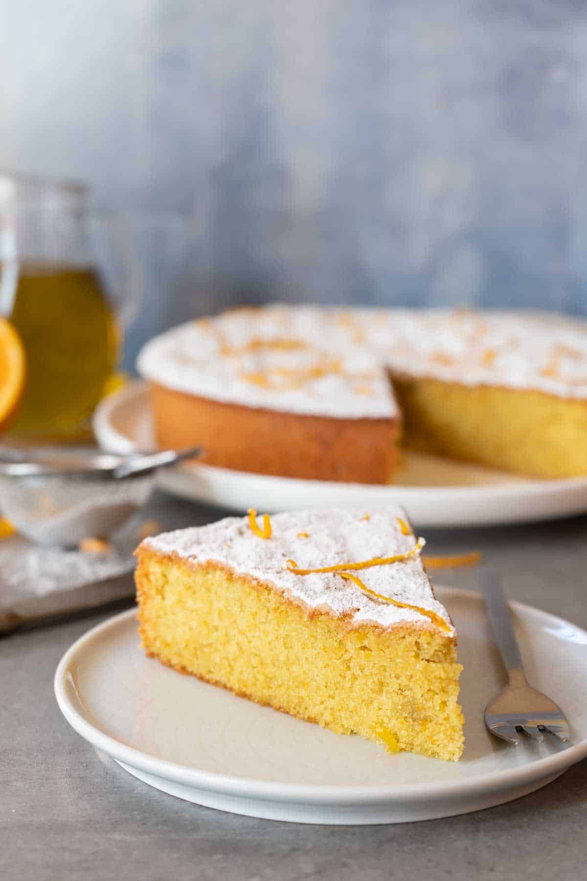 olive oil orange cake portion on a plate