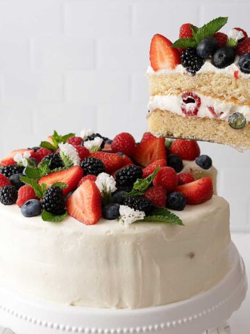 Summer berry cake being served