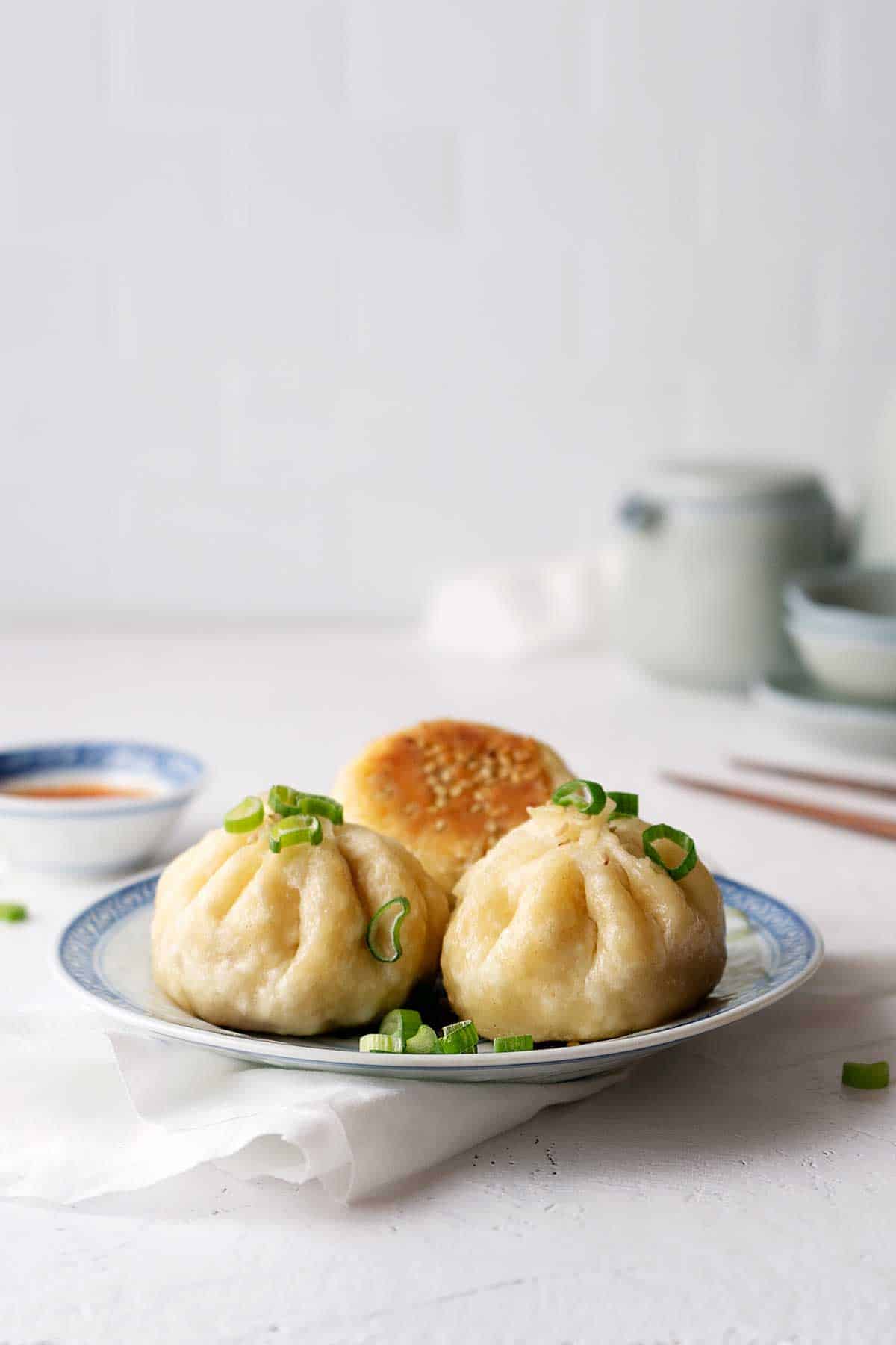 Pan-fried baozi on a plate