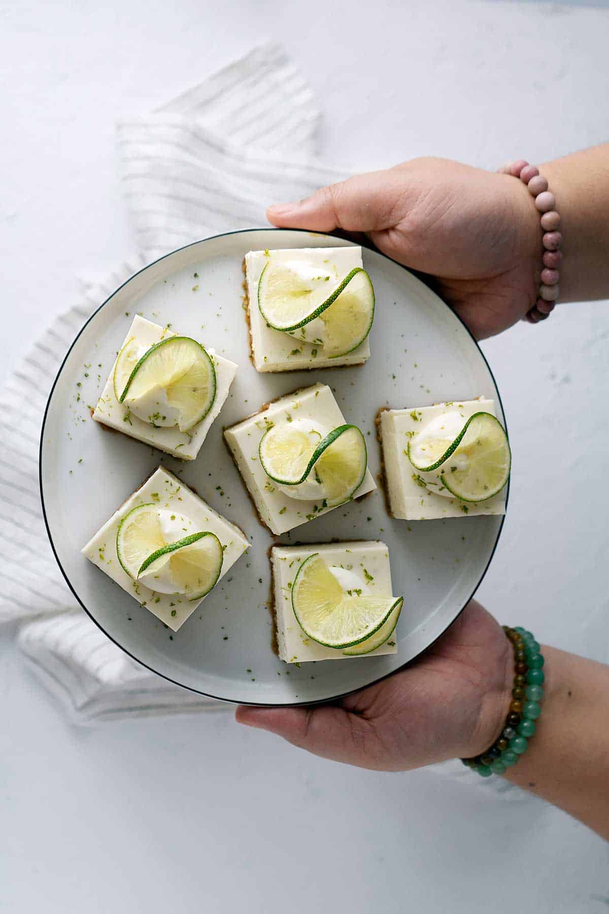 Serving no-bake lime cheesecake bars