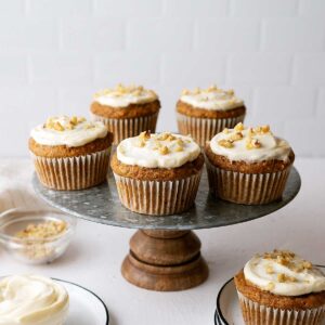 healthy carrot cake muffins on a serving stand