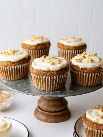 healthy carrot cake muffins on a serving stand