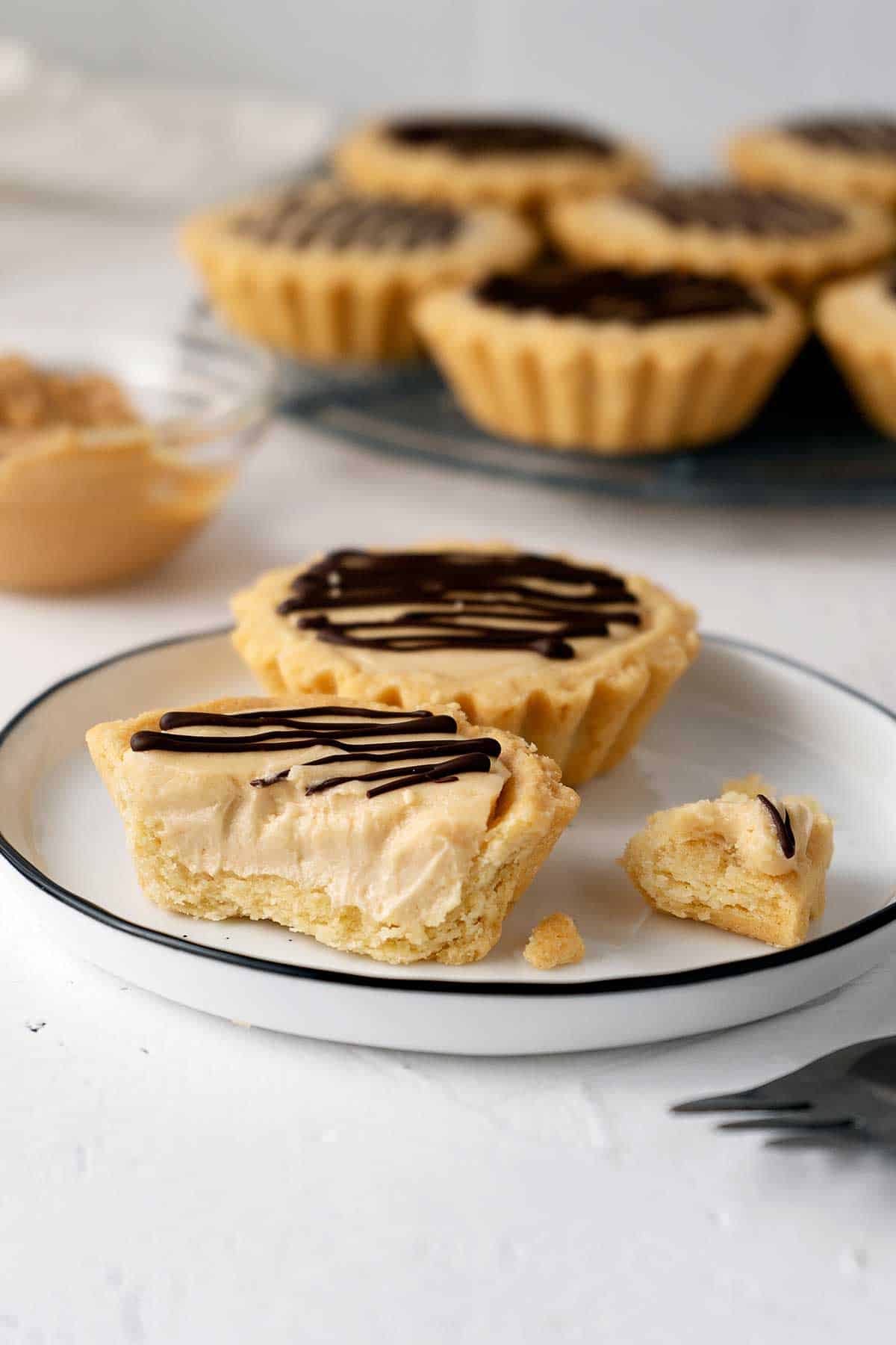 half eaten peanut butter cheesecake tart.