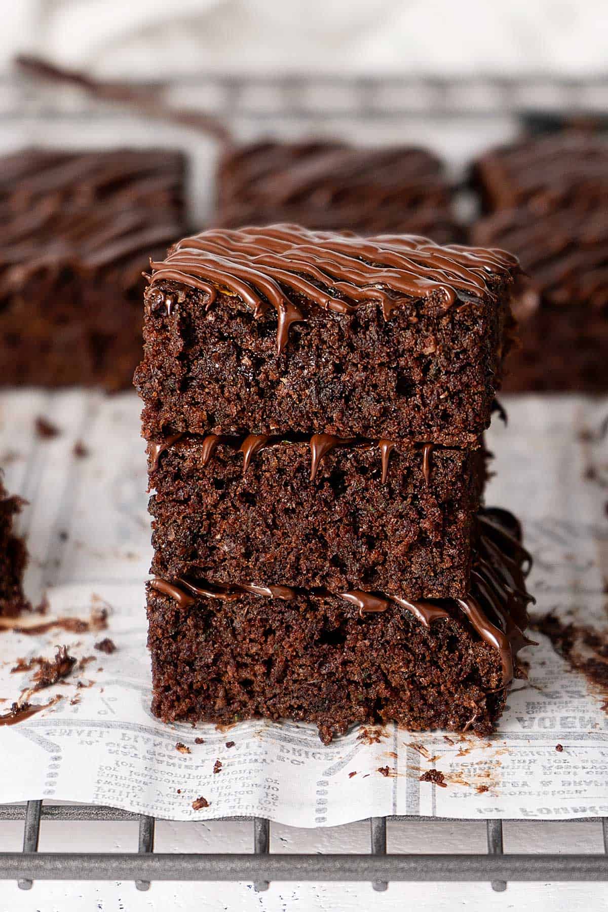 stacked brownies on a cooling rack