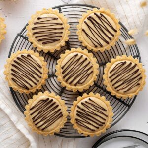 overhead view peanut butter cheesecake tarts.