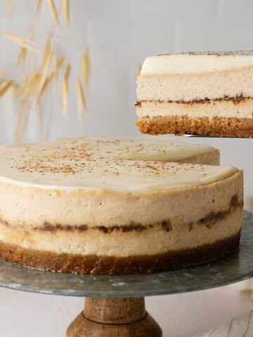 serving cinnamon roll cheesecake.