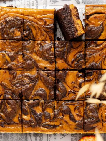 Overhead view pumpkin cheesecake brownies.