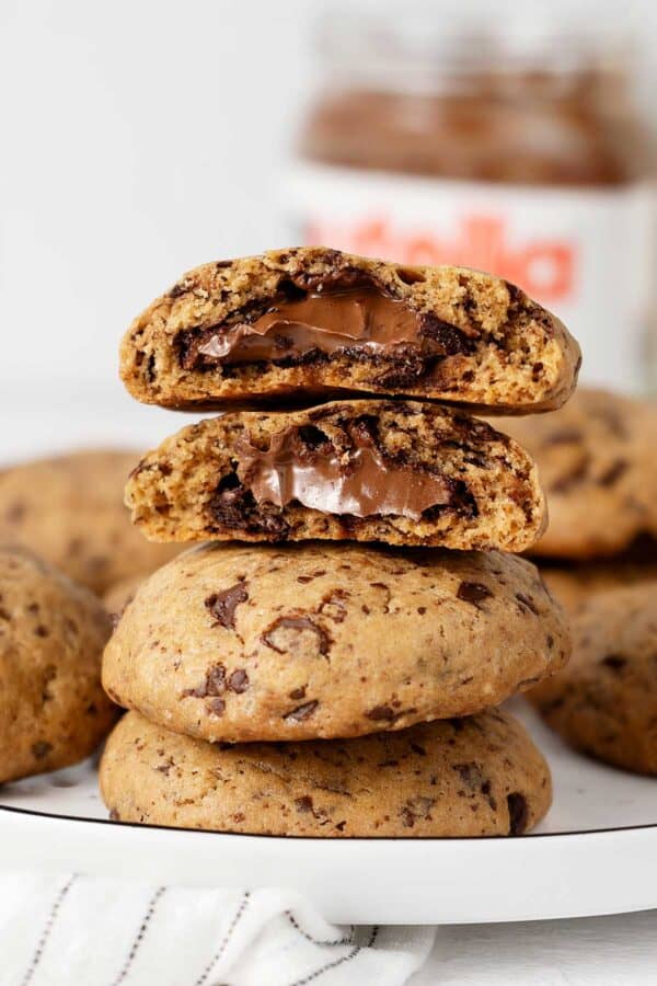 A stack of Nutella stuffed chocolate chip cookies.