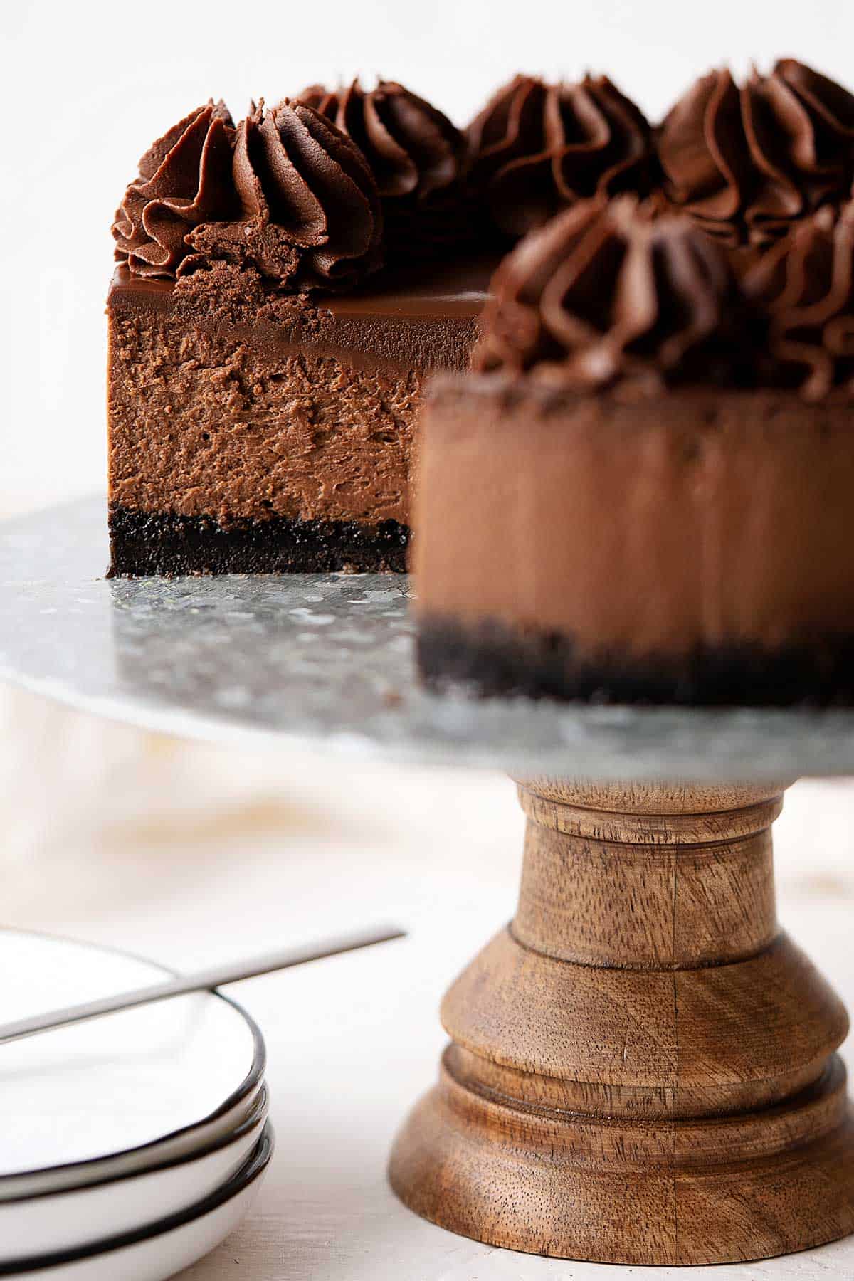 cut chocolate cheesecake showing the inside.