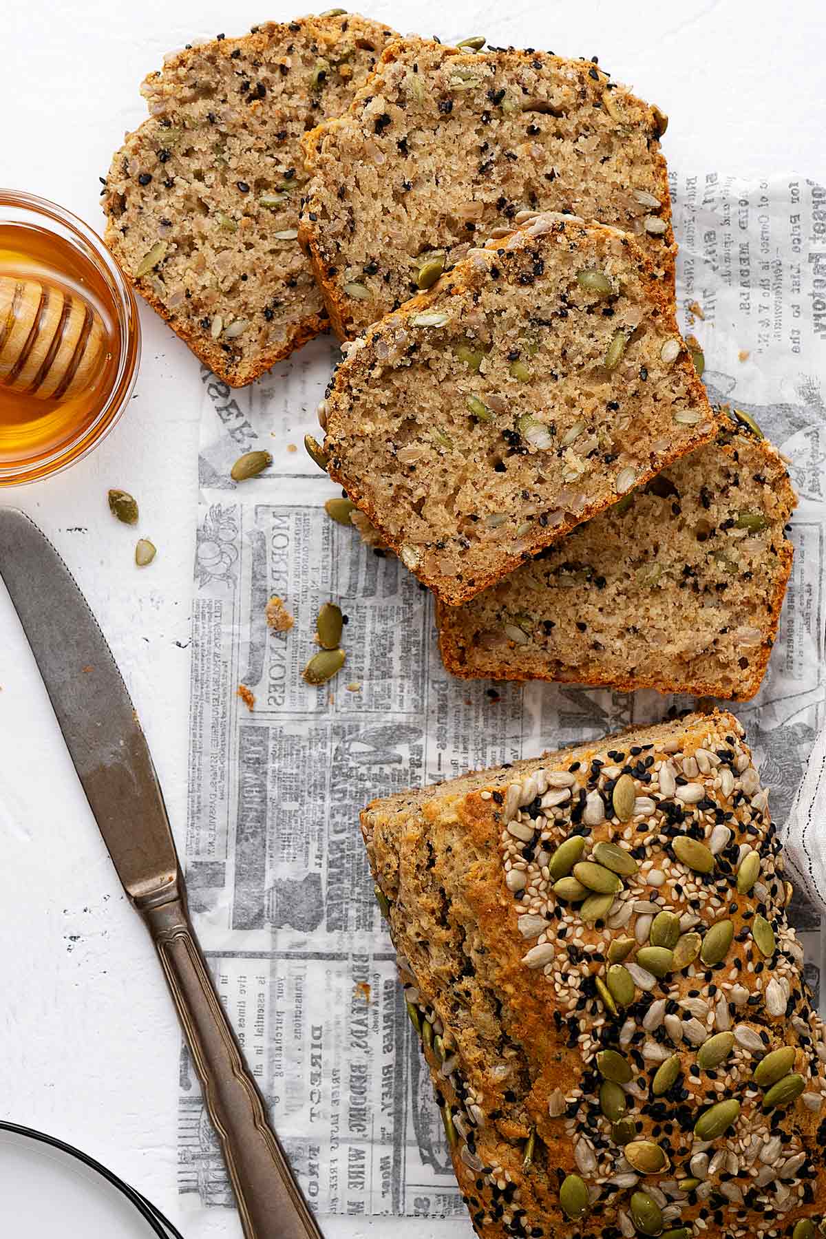 Showing the texture of sliced multi-seed bread.