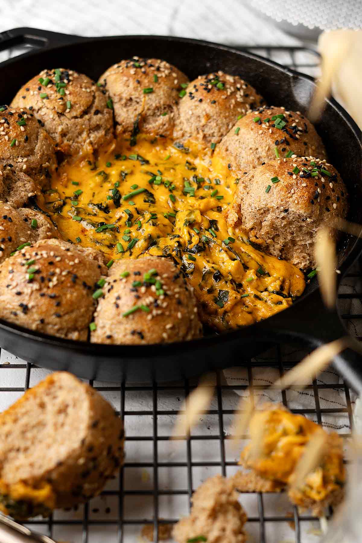 Cheese oozing out from skillet pull apart whole wheat buns