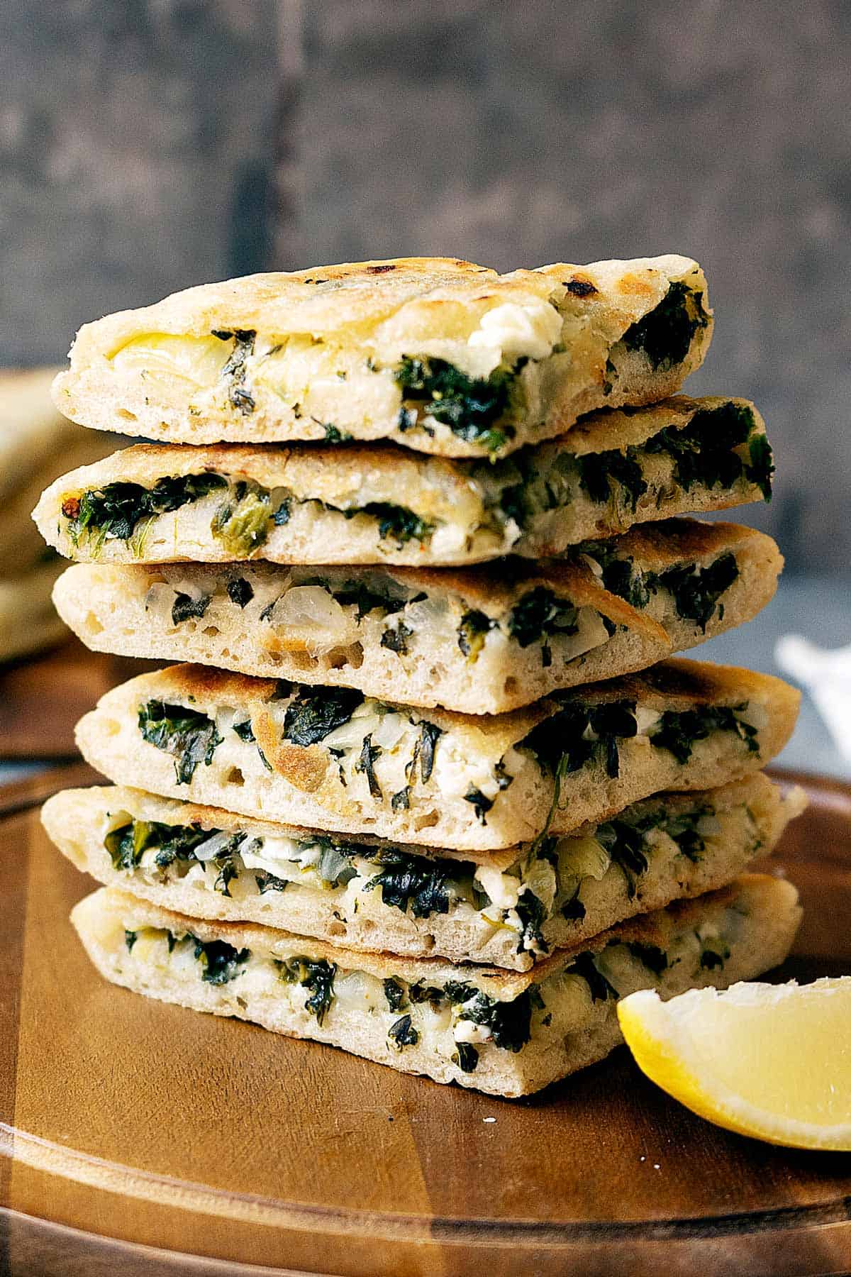 Slices of spinach and feta gozleme stacked