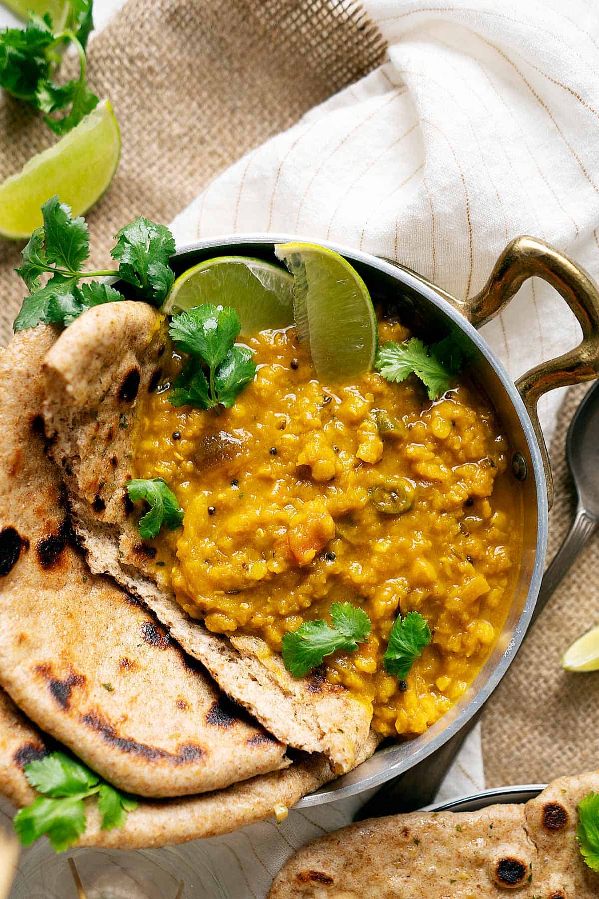 Lentil turmeric curry in a bowl view from top