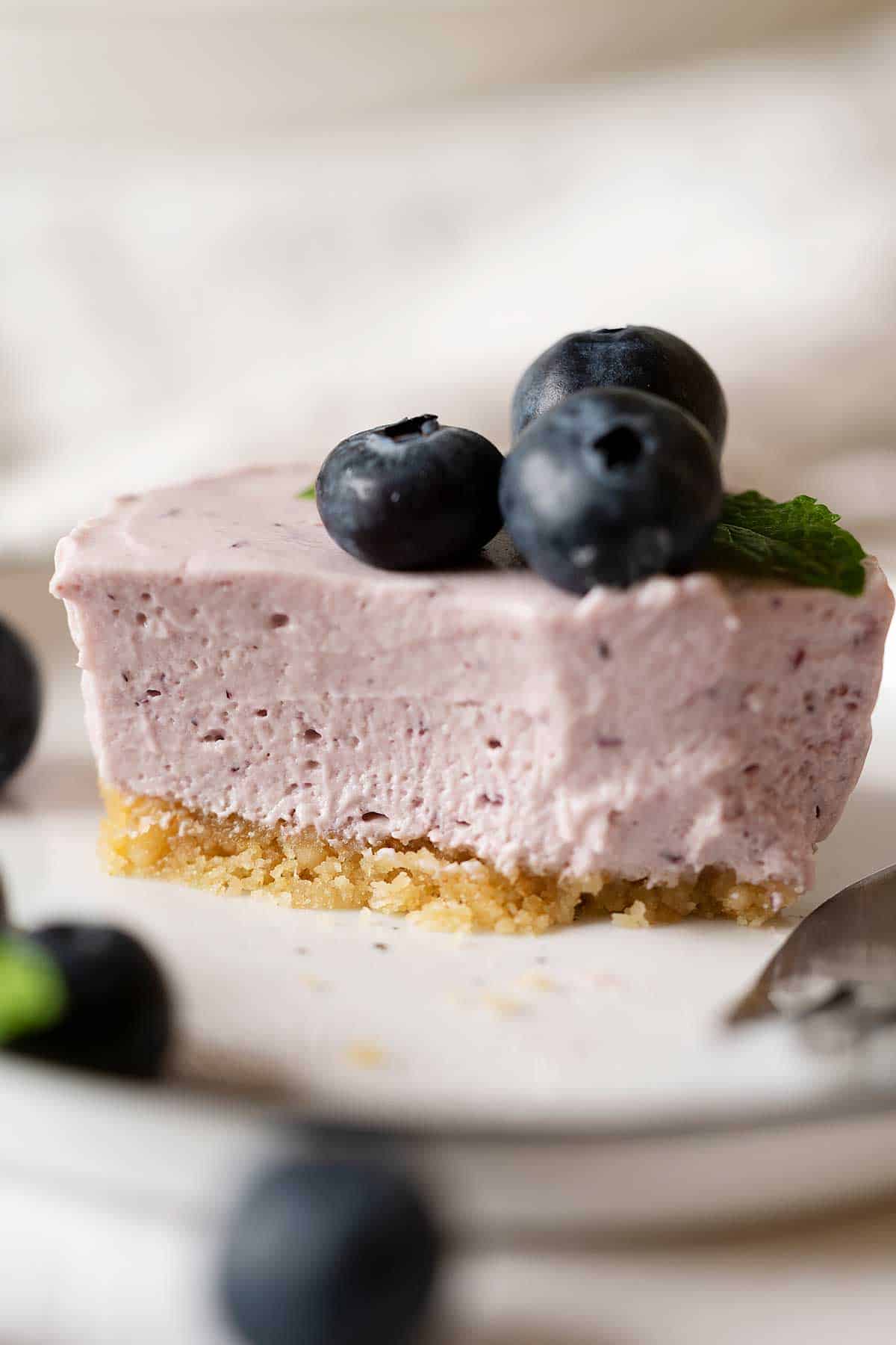 half eaten mini blueberry cheesecake.