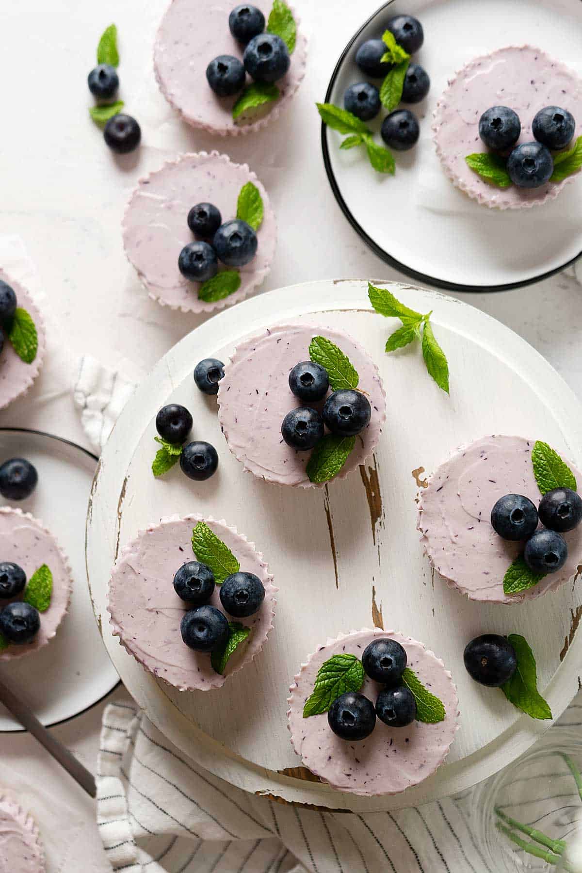 mini blueberry cheesecakes from top view.