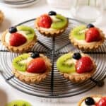 Healthier fruit tarts on a rack