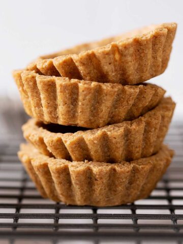 spelt tart shells stacked.