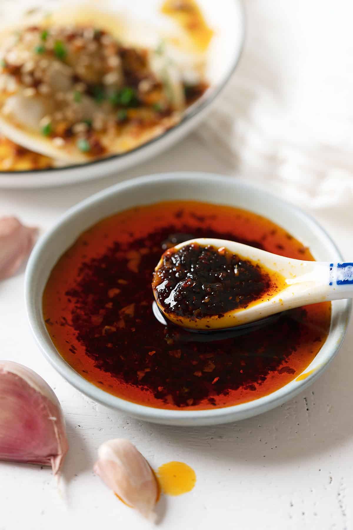 Spooning garlic chili oil