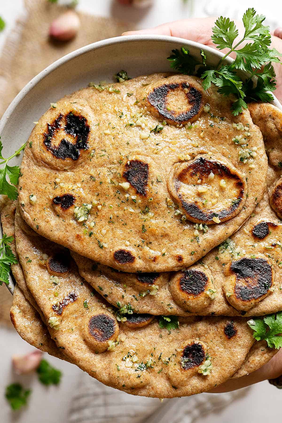 Close up of whole wheat garlic naan view from top