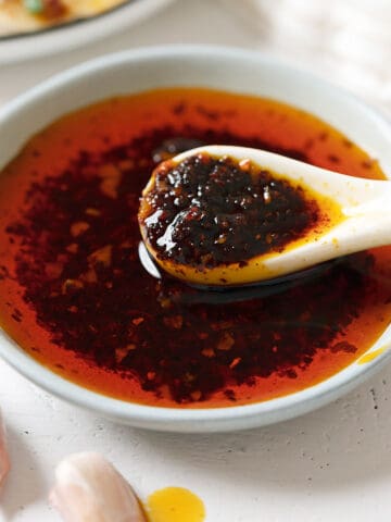 Spooning garlic chili oil