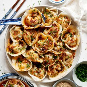 Wontons in garlic chili oil in a plate