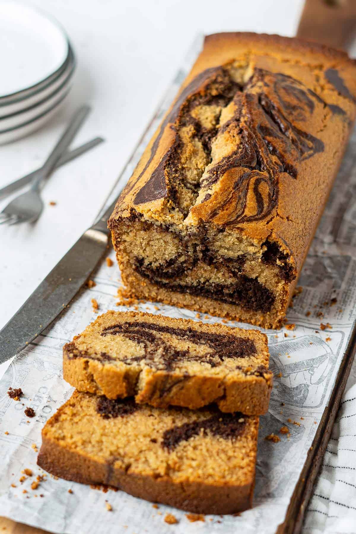 A loaf and a few slices of gluten free marble cake