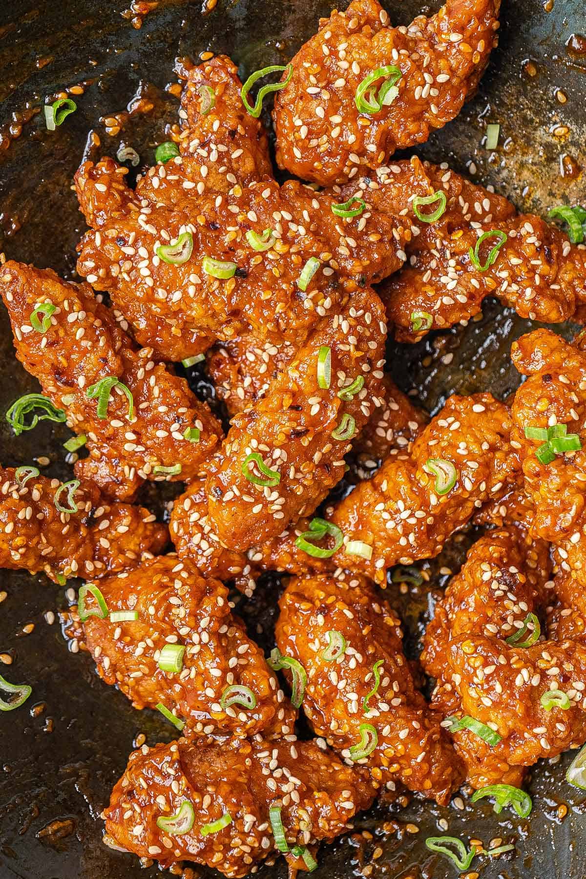 Sesame chicken in a wok