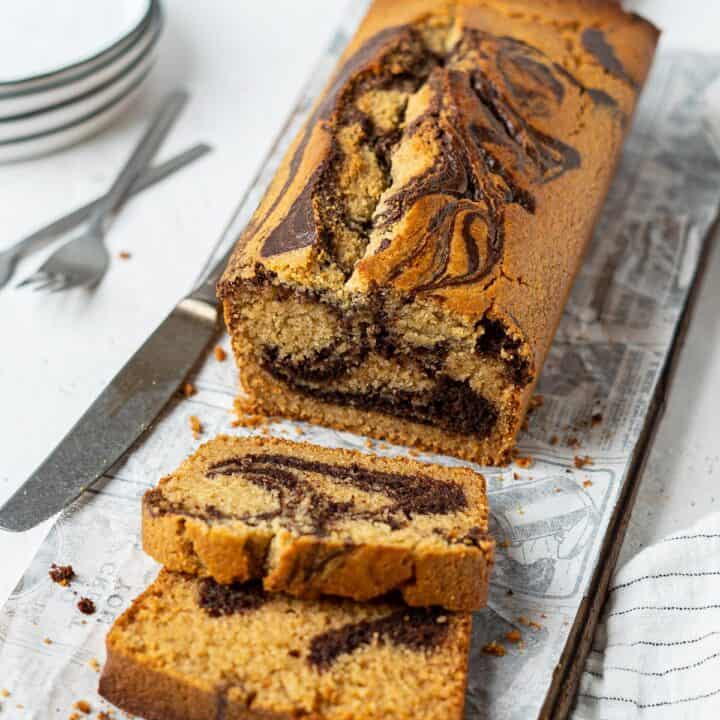 A loaf and a few slices of gluten free marble cake
