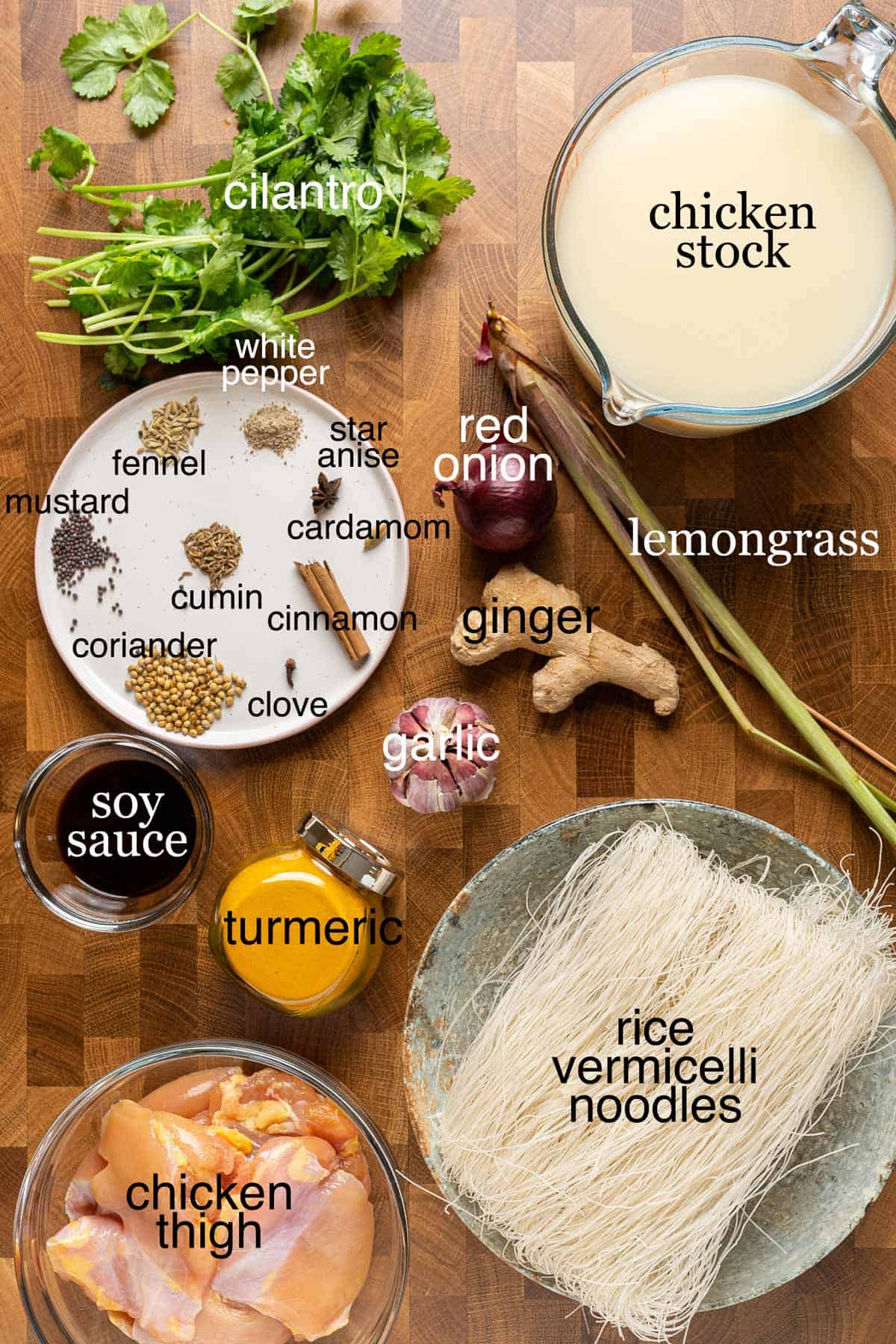 Ingredients to make lemongrass ginger chicken soup with rice noodles
