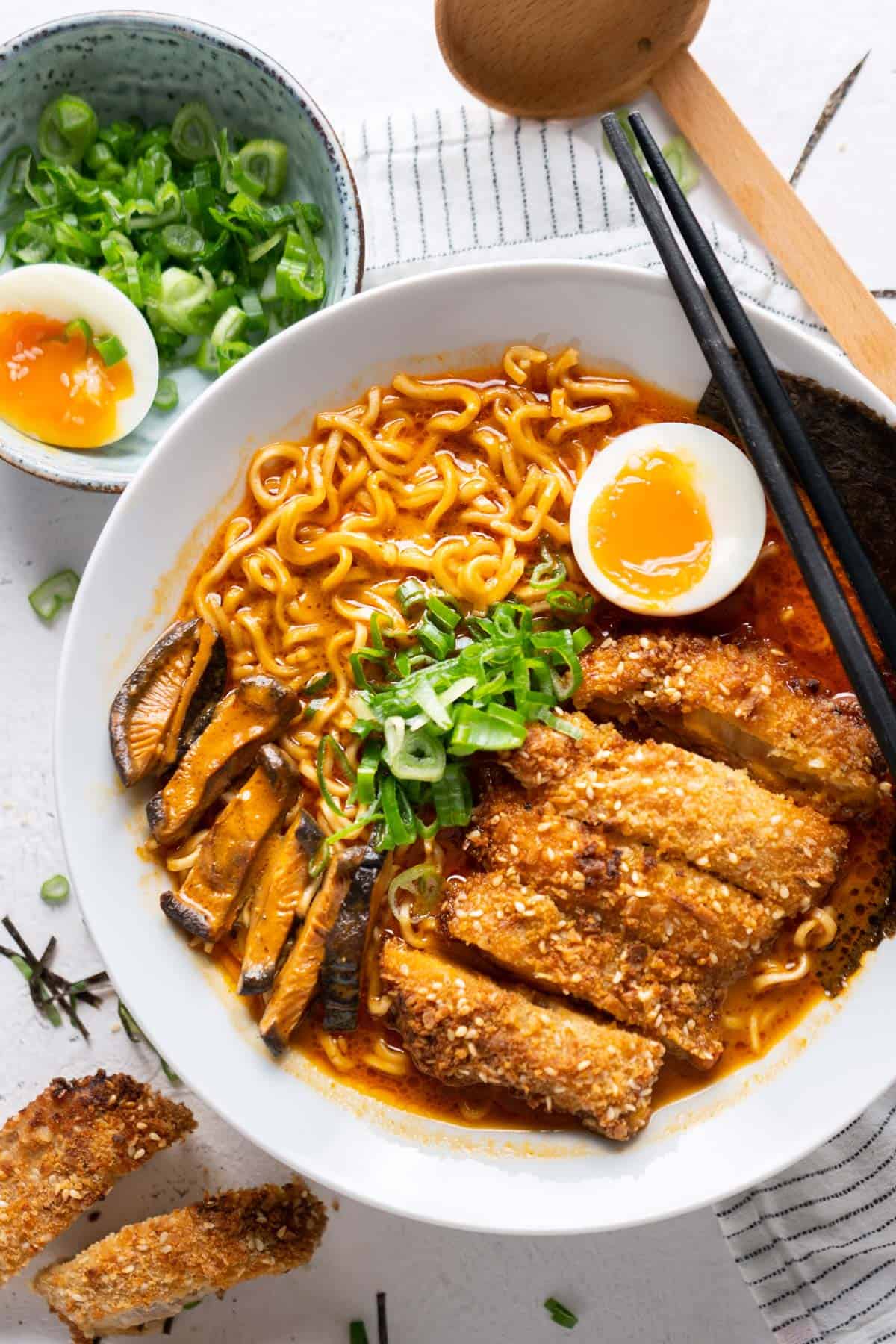Spicy ramen with chicken katsu in a bowl view from top