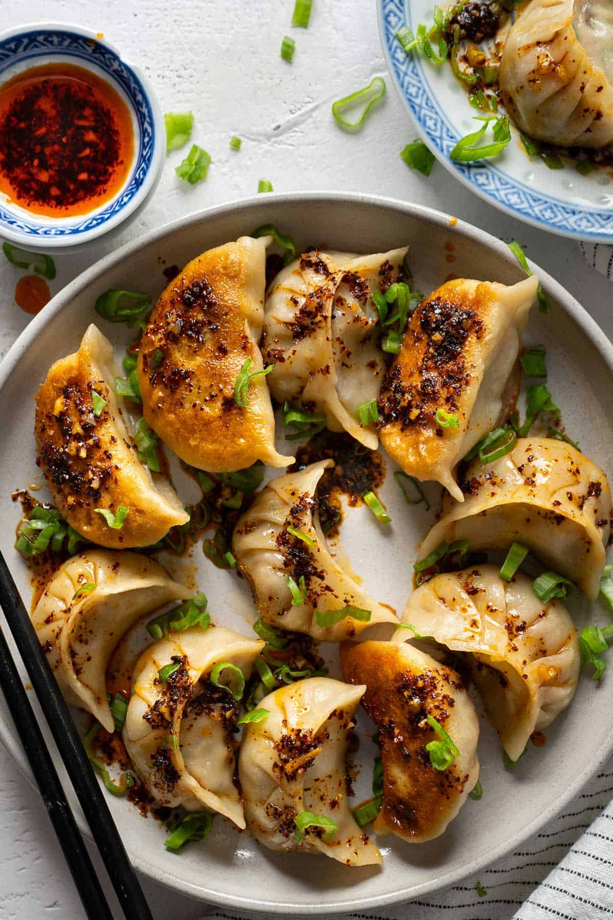 Cooked potstickers in a plate view from top