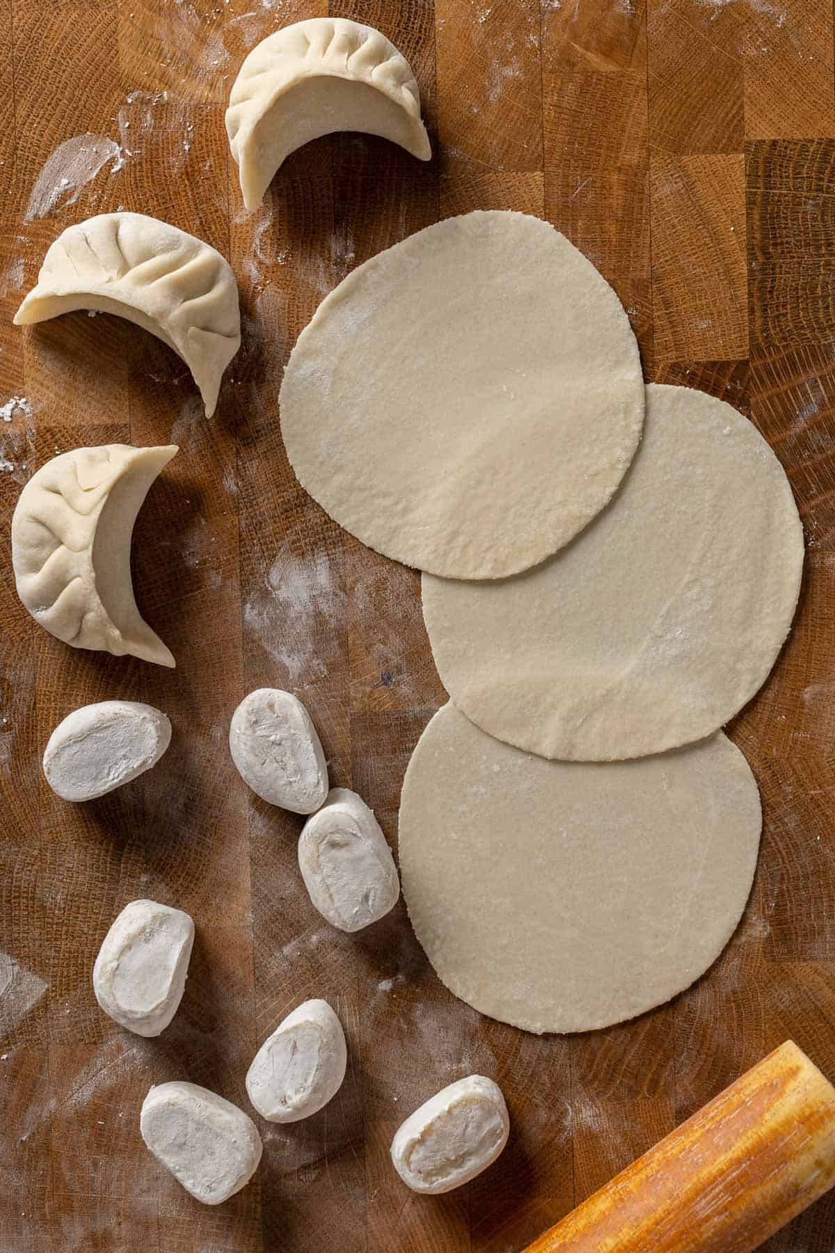 Potsticker dough pieces, rolled and shaped