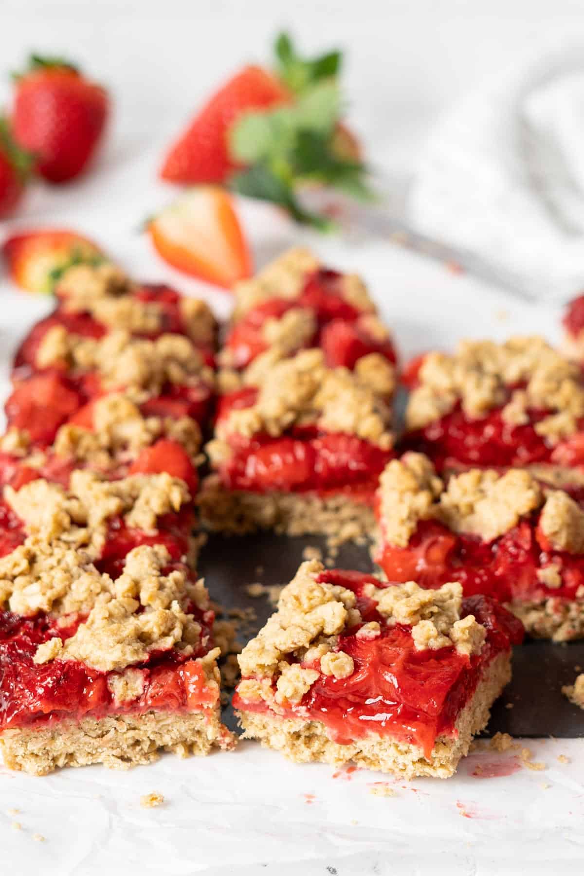 Sliced healthy strawberry oatmeal bars view from front