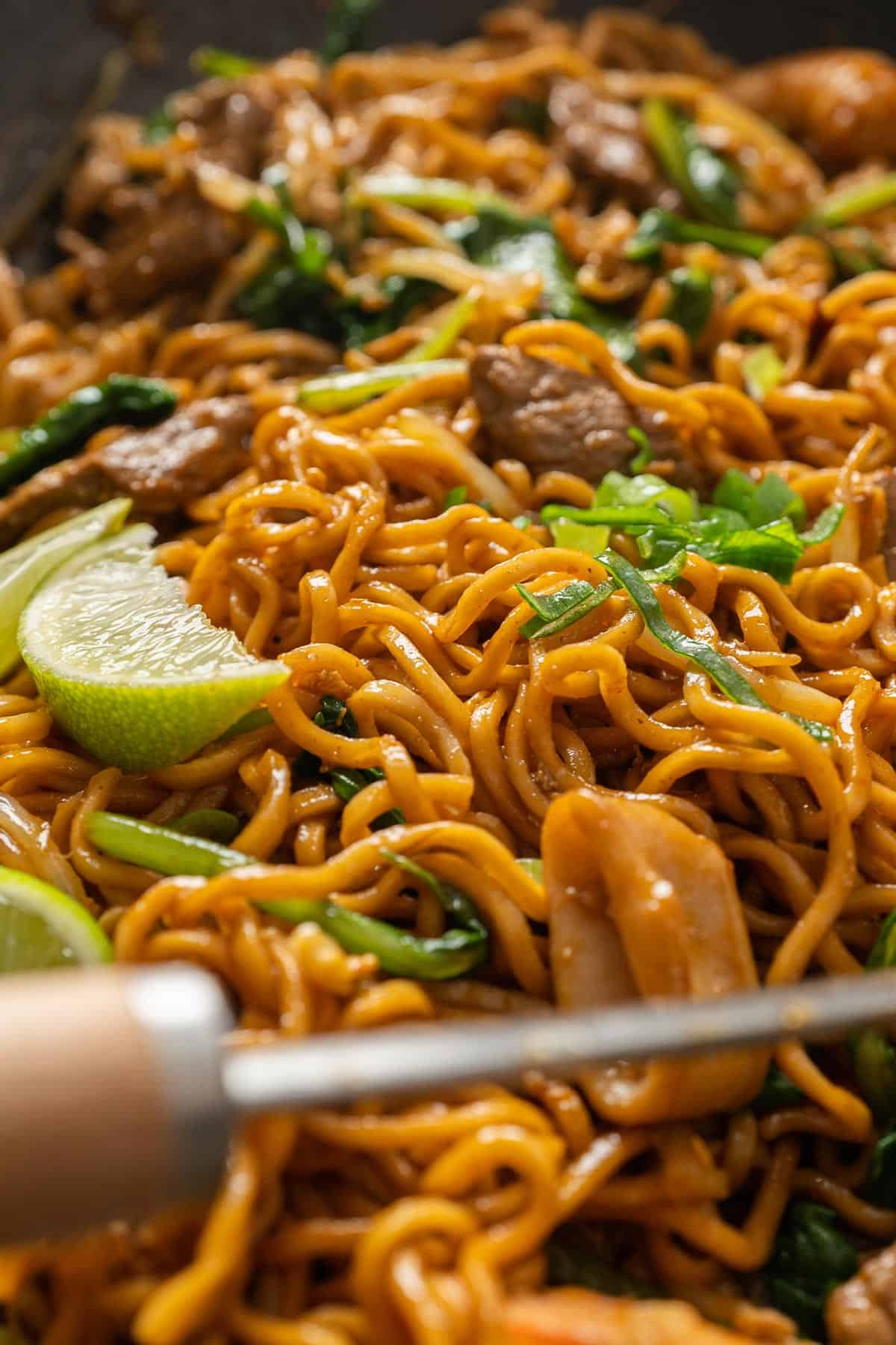 Close up Malaysian style mee goreng in a wok