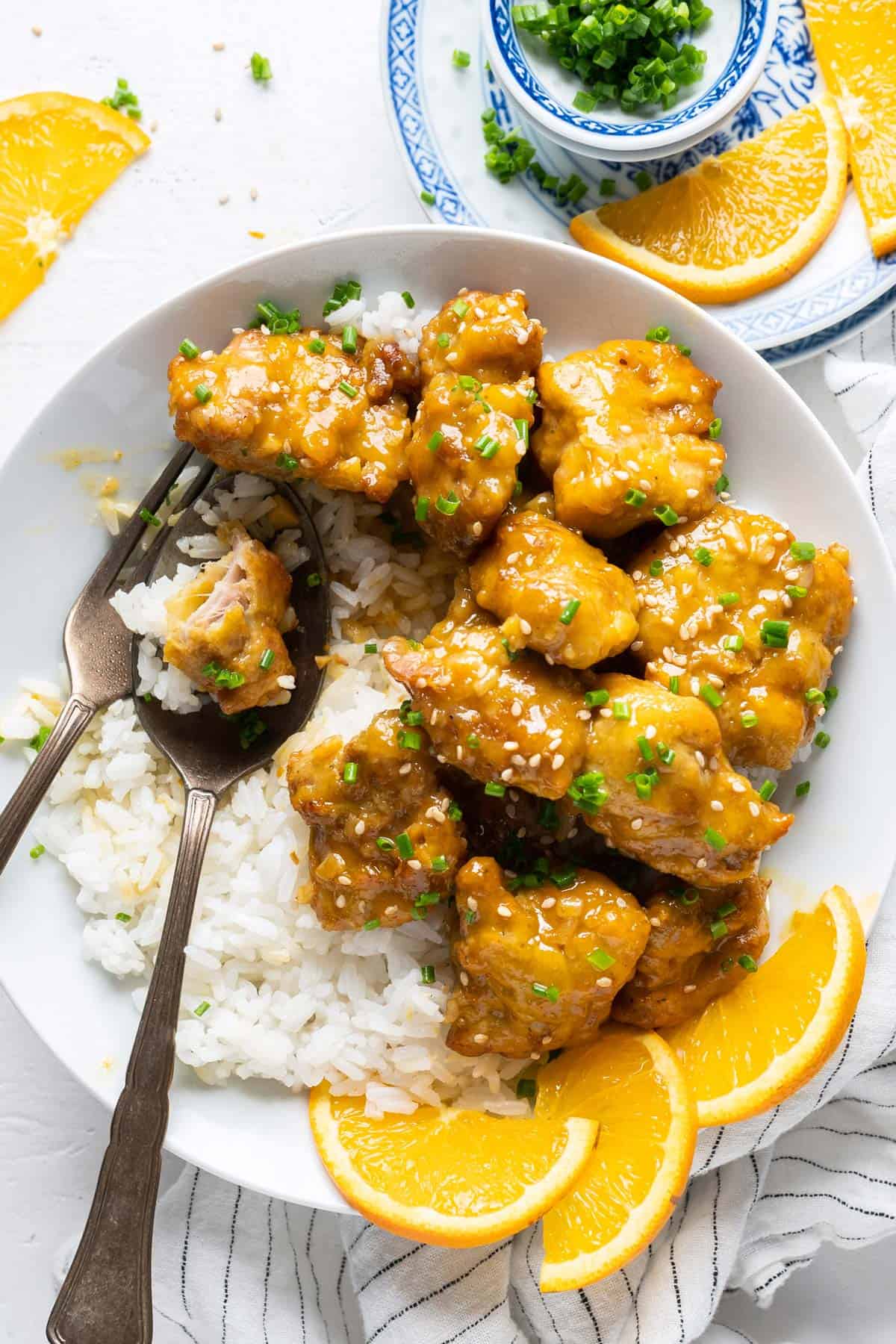 Eating some rice with air-fryer orange chicken.