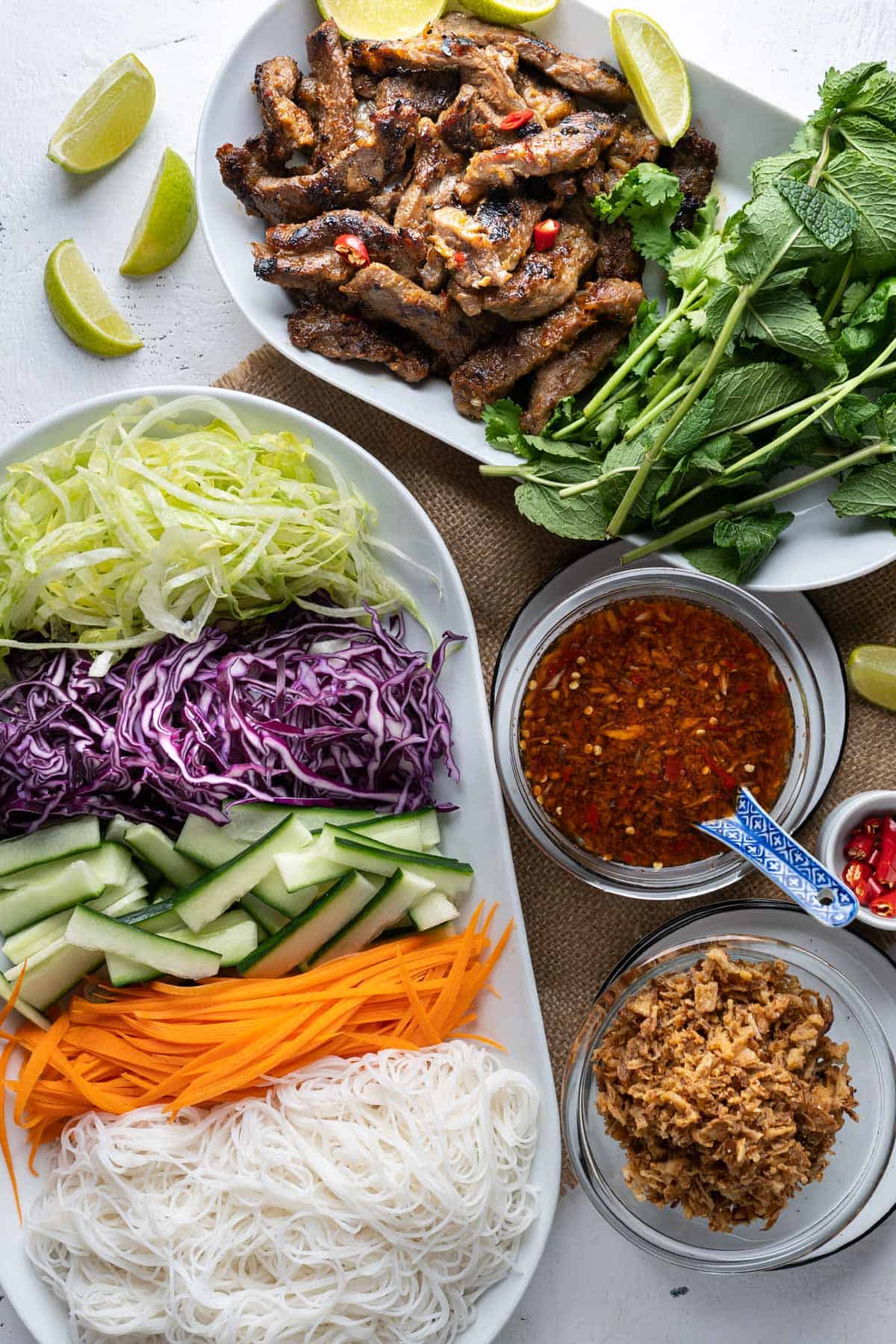 Buffet-style of Vietnamese lemongrass beef noodles salad.