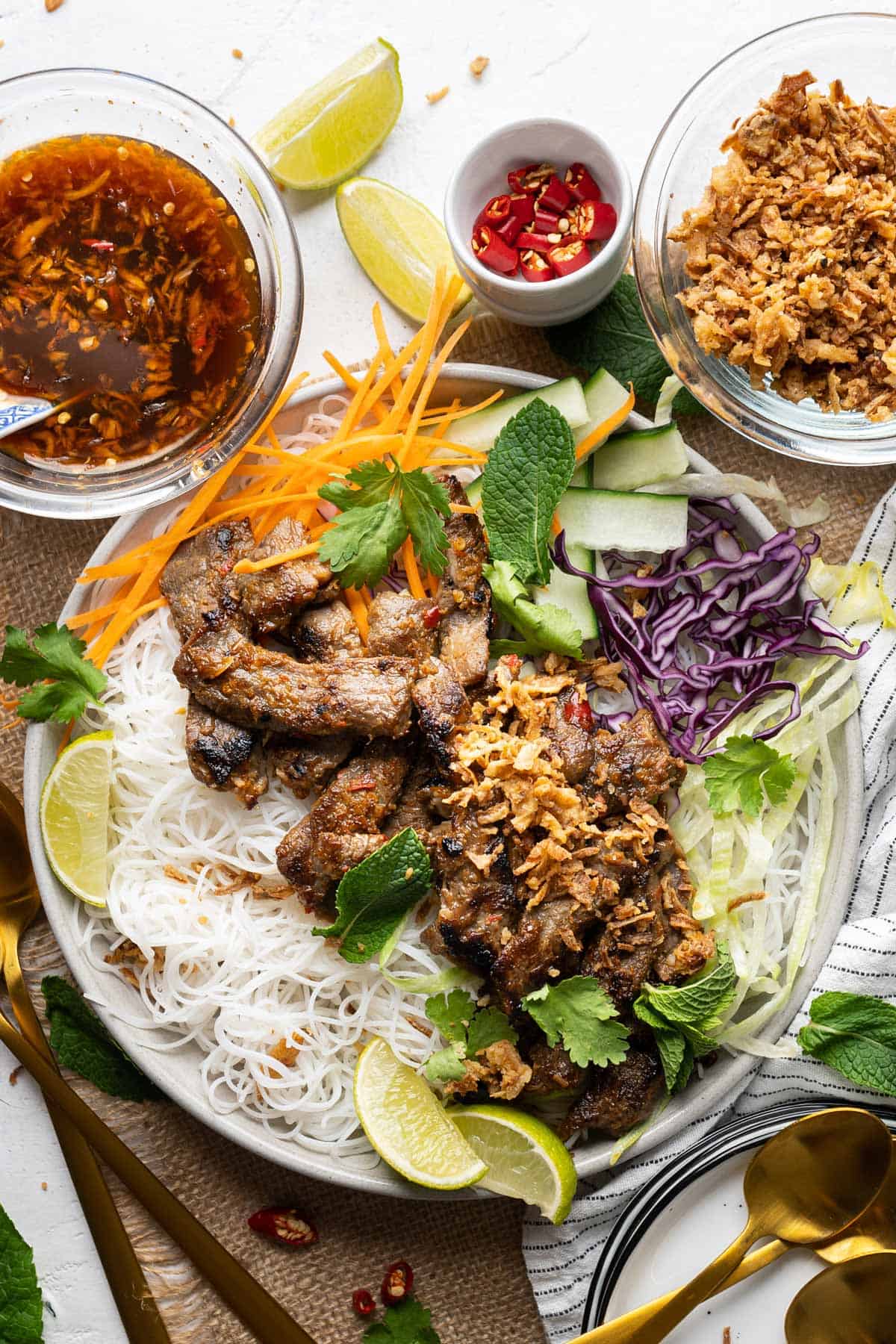 Vietnamese lemongrass beef noodles salad in a plate view from top