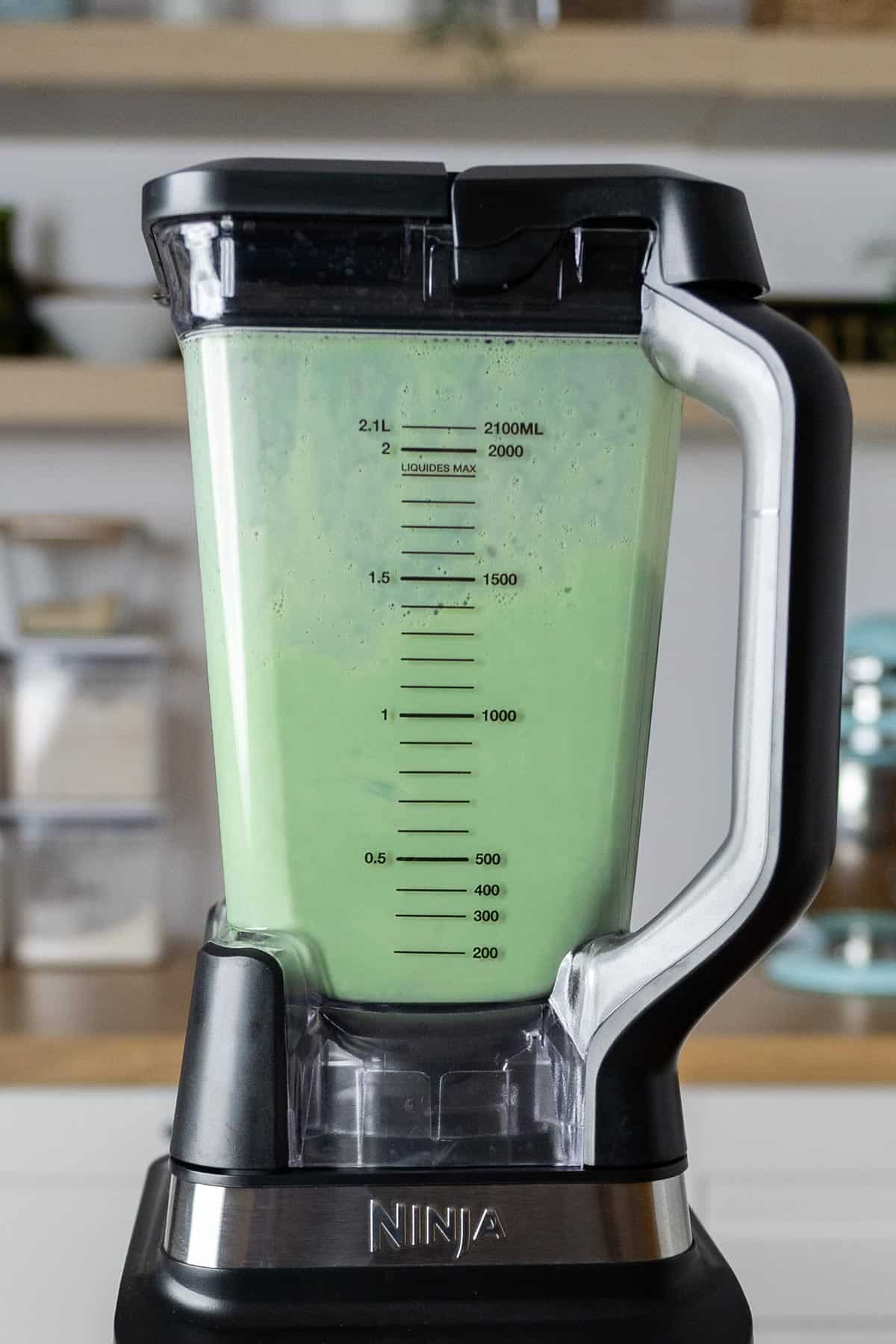 Dissolving matcha using a food blender.